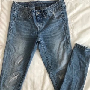 Ripped mid rise jeans